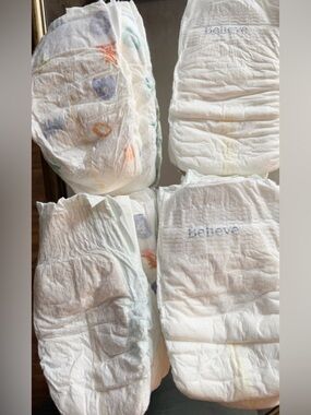 Lot of 22 SZ 4 Baby Diapers Loose Different Brands & Baby On Board Decal